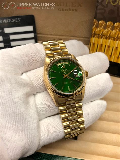 gold and green rolex
